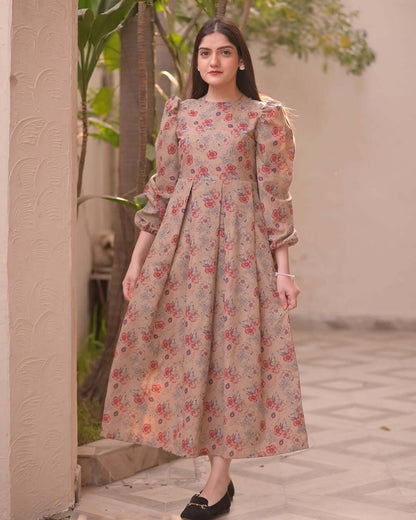 Lotus print cotton midi gown with puff sleeves, perfect for summer. Elegant style in pure cotton fabric. Available in various sizes.