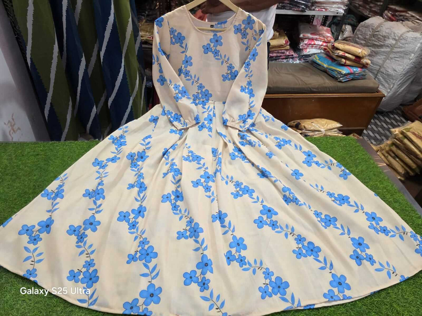 Lotus print cotton midi gown in blue floral design, perfect for summer style and elegance.